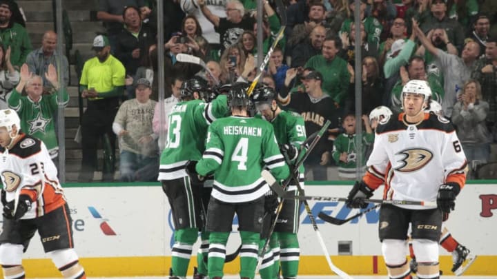 DALLAS, TX - OCTOBER 13: Miro Heiskanen #4 and the Dallas Stars celebrate a goal against the Anaheim Ducks at the American Airlines Center on October 13, 2018 in Dallas, Texas. (Photo by Glenn James/NHLI via Getty Images)