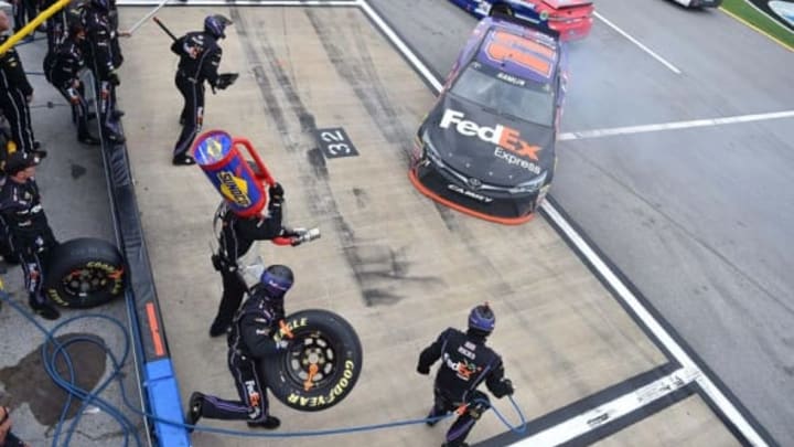 May 1, 2016; Talladega, AL, USA; NASCAR Sprint Cup Series driver Denny Hamlin (11) spins on pit lane during the GEICO 500 at Talladega Superspeedway. Mandatory Credit: Jasen Vinlove-USA TODAY Sports