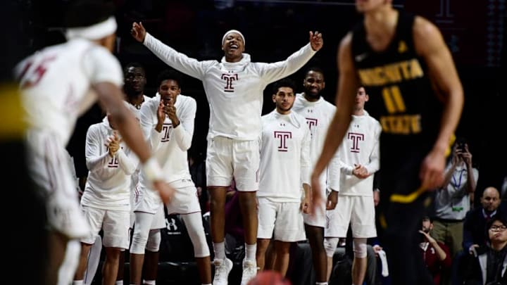 PHILADELPHIA, PA - FEBRUARY 01: J.P. Moorman II #4 (C) of the Temple Owls reacts on the bench to a score against the Wichita State Shockers during the second half at the Liacouras Center on February 1, 2018 in Philadelphia, Pennsylvania. Temple defeated 16th ranked Wichita 81-79 in overtime. (Photo by Corey Perrine/Getty Images)