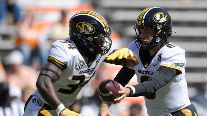 Missouri quarterback Connor Bazelak (8) hands the ball off to Missouri running back Larry Rountree III (34) during the third quarter during a game between Tennessee and Missouri at Neyland Stadium in Knoxville, Tenn. on Saturday, Oct. 3, 2020.100320 Tenn Mo Jpg