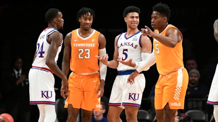 NEW YORK, NEW YORK - NOVEMBER 23: Quentin Grimes #5 and teammate Lagerald Vick #24 of the Kansas Jayhawks and teammates Admiral Schofield #5 and Jordan Bowden #23 of the Tennessee Volunteers react during the second half of the game against Kansas Jayhawks at the NIT Season Tip-Off Tournament at Barclays Center on November 23, 2018 in the Brooklyn borough of New York City. (Photo by Sarah Stier/Getty Images)