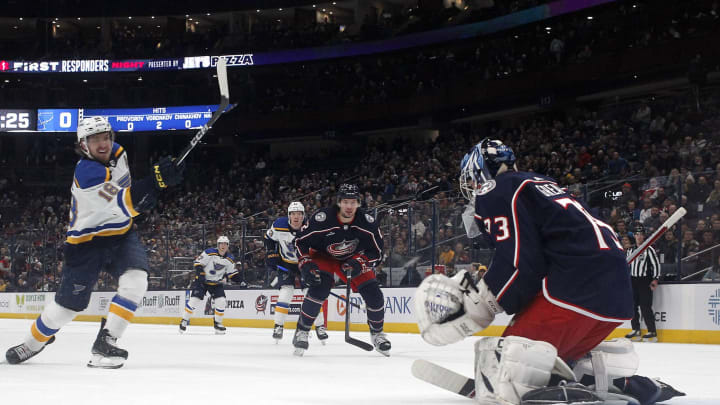 Dec 8, 2023; Columbus, Ohio, USA; St. Louis Blues center Robert Thomas (18) scores a goal against Columbus Blue Jackets goalie Jet Greaves (73) during the first period at Nationwide Arena. Mandatory Credit: Russell LaBounty-USA TODAY Sports