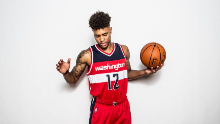 TARRYTOWN, NY - AUGUST 08: Kelly Oubre Jr. #12 of the Washington Wizards poses for a portrait during the 2015 NBA rookie photo shoot on August 8, 2015 at the Madison Square Garden Training Facility in Tarrytown, New York. (Photo by Nick Laham/Getty Images)