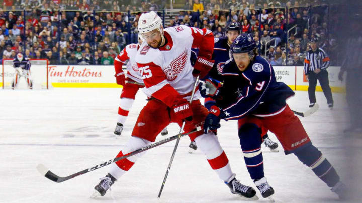 COLUMBUS, OH - MARCH 9: Mike Green #25 of the Detroit Red Wings and Artemi Panarin #9 of the Columbus Blue Jackets battle for control of the puck during the second period on March 9, 2018 at Nationwide Arena in Columbus, Ohio. (Photo by Kirk Irwin/Getty Images)