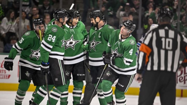 Oct 17, 2022; Dallas, Texas, USA; Dallas Stars center Roope Hintz (24) and defenseman Miro Heiskanen (4) and center Joe Pavelski (16) and left wing Jamie Benn (14) and left wing Jason Robertson (21) celebrates a goal scored by Heiskanen against the Winnipeg Jets during the third period at the American Airlines Center. Mandatory Credit: Jerome Miron-USA TODAY Sports