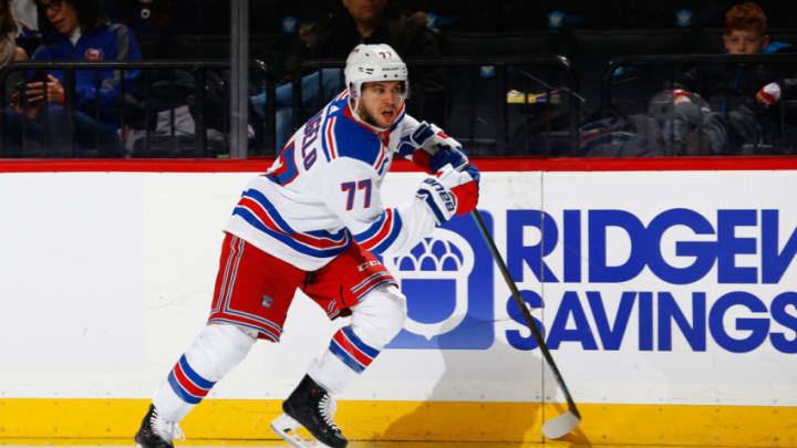 NEW YORK, NY - JANUARY 12: Tony DeAngelo #77 of the New York Rangers skates against the New York Islanders at Barclays Center on January 12, 2019 the Brooklyn borough of New York City. New York Rangers defeated the New York Islanders 2-1. (Photo by Mike Stobe/NHLI via Getty Images)