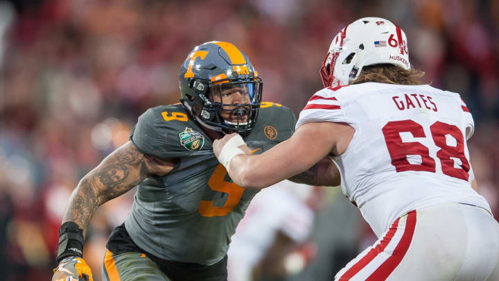 Tennessee Volunteers defensive end Derek Barnett (9) is blocked by Nebraska Cornhuskers offensive lineman Nick Gates (68) (Photo by Bryan Lynn/Icon Sportswire via Getty Images)