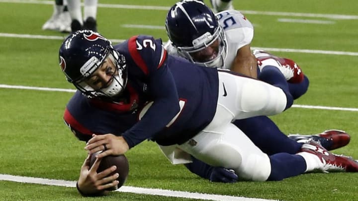 HOUSTON, TEXAS - DECEMBER 29: AJ McCarron #2 of the Houston Texans runs for a touchdown during the third quarter against the Tennessee Titans at NRG Stadium on December 29, 2019 in Houston, Texas. (Photo by Bob Levey/Getty Images)
