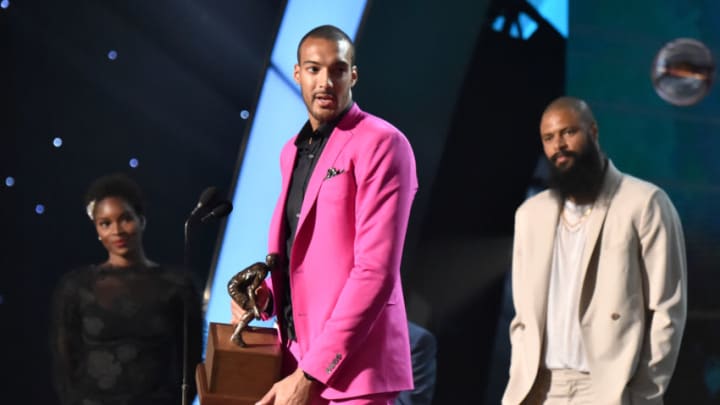 SANTA MONICA, CA - JUNE 25: Defensive Player of the Year Rudy Gobert speaks onstage at the 2018 NBA Awards at Barkar Hangar on June 25, 2018 in Santa Monica, California. (Photo by Kevin Mazur/Getty Images for Turner Sports)