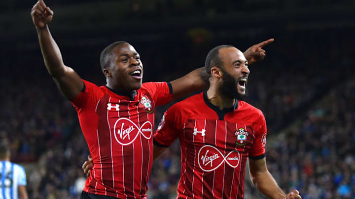 HUDDERSFIELD, ENGLAND - DECEMBER 22: Michael Obafemi of Southampton celebrates after scoring his team's third goal with Nathan Redmond of Southampton during the Premier League match between Huddersfield Town and Southampton FC at John Smith's Stadium on December 22, 2018 in Huddersfield, United Kingdom. (Photo by Nathan Stirk/Getty Images)
