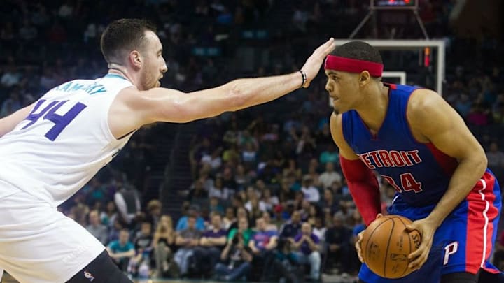 Mar 11, 2016; Charlotte, NC, USA; Detroit Pistons forward Tobias Harris (34) controls the ball against Charlotte Hornets forward Frank Kaminsky (44) in the first half at Time Warner Cable Arena. Mandatory Credit: Jeremy Brevard-USA TODAY Sports