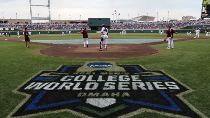 OMAHA, NEBRASKA - JUNE 29: Members of the Mississippi St. Bulldogs warm up on the field before the start of game two against the Vanderbilt Commodores in the College World Series Championship at TD Ameritrade Park Omaha on June 28, 2021 in Omaha, Nebraska. (Photo by Sean M. Haffey/Getty Images)