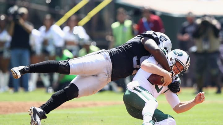 OAKLAND, CA - SEPTEMBER 17: Mario Edwards #97 of the Oakland Raiders tackles Josh McCown #15 of the New York Jets at Oakland-Alameda County Coliseum on September 17, 2017 in Oakland, California. (Photo by Ezra Shaw/Getty Images)