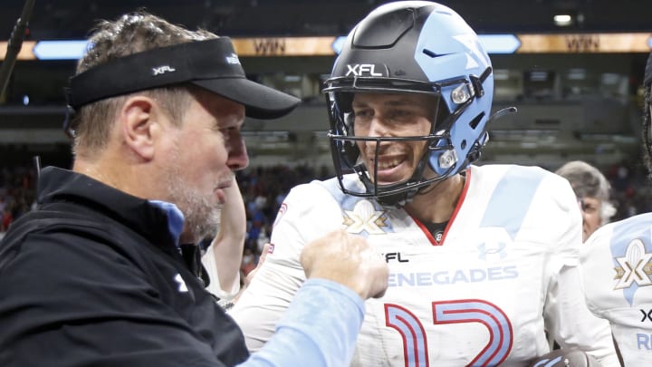 SAN ANTONIO, TX – MAY 13 : Bob Stoops head coach of the Arlington Renegades congratulated Luis Perez #12 of the Arlington Renegades,quaterback who was awarded MVP after they defeated DC Defenders in XFL Championship game at the Alamodome on May 13 2023 in San Antonio, Texas. (Photo by Ronald Cortes/Getty Images)