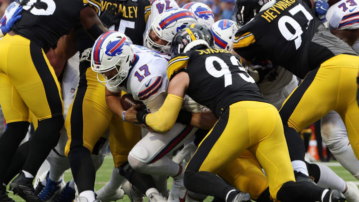 ORCHARD PARK, NEW YORK – SEPTEMBER 12: Josh Allen #17 of the Buffalo Bills is hit by Joe Schobert #93 of the Pittsburgh Steelers during the first half at Highmark Stadium on September 12, 2021 in Orchard Park, New York. (Photo by Timothy T Ludwig/Getty Images)