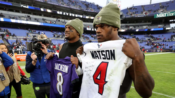BALTIMORE, MARYLAND – NOVEMBER 17: Quarterbacks Lamar Jackson #8 of the Baltimore Ravens and Deshaun Watson #4 of the Houston Texans exchange jerseys following the Ravens win at M&T Bank Stadium on November 17, 2019 in Baltimore, Maryland. (Photo by Rob Carr/Getty Images)
