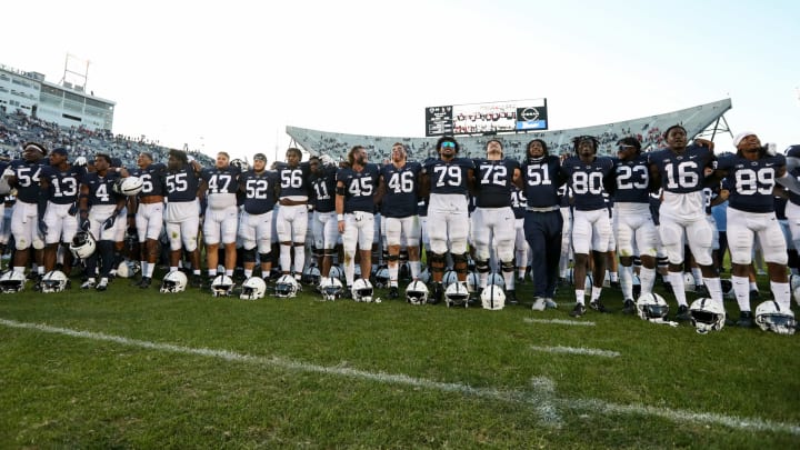 Sep 11, 2021; University Park, Pennsylvania, USA; Penn State Nittany Lion players sign their alma-mater following the conclusion of the game at Beaver Stadium. Penn State defeated Ball State 44-13. Mandatory Credit: Matthew OHaren-USA TODAY Sports