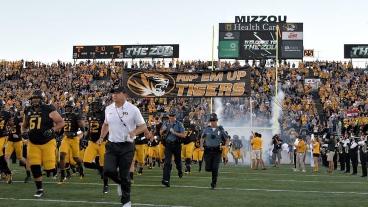 Sep 10, 2016; Columbia, MO, USA; Missouri Tigers head coach Barry Odom and players run on the field before the game against the Eastern Michigan Eagles at Faurot Field. Mandatory Credit: Denny Medley-USA TODAY Sports