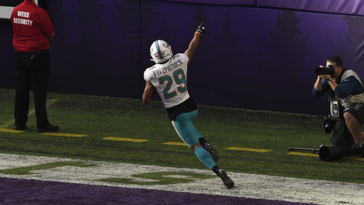 MINNEAPOLIS, MN – DECEMBER 16: Minkah Fitzpatrick #29 of the Miami Dolphins celebrates scoring a touchdown after intercepting a pass by Kirk Cousins #8 of the Minnesota Vikings in the second quarter of the game at U.S. Bank Stadium on December 16, 2018 in Minneapolis, Minnesota. Fitzpatrick scored a 50 yard touchdown on the play. (Photo by Hannah Foslien/Getty Images)