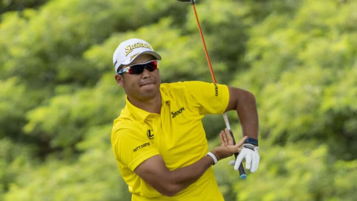 January 16, 2022; Honolulu, Hawaii, USA; Hideki Matsuyama reacts after hitting his tee shot on the second hole during the final round of the Sony Open in Hawaii golf tournament at Waialae Country Club. Mandatory Credit: Kyle Terada-USA TODAY Sports