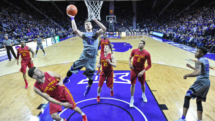 MANHATTAN, KS – JANUARY 16: Forward Dean Wade #32 of the Kansas State Wildcats scores over guard Georges Niang #31 of the Iowa State Cyclones during the first half on January 16, 2016 at Bramlage Coliseum in Manhattan, Kansas. (Photo by Peter G. Aiken/Getty Images)
