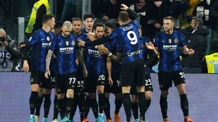 TURIN, ITALY - APRIL 03: Hakan Calhanoglu of FC Internazionale celebrates his first goal on penalty during the Serie A match between Juventus and FC Internazionale at Stadio Allianz on April 03, 2021 in Turin, Italy. (Photo by Pier Marco Tacca/Anadolu Agency via Getty Images)