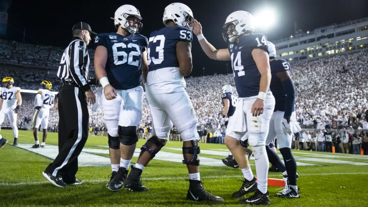 UNIVERSITY PARK, PA – OCTOBER 19: Sean Clifford #14 of the Penn State Nittany Lions celebrates a touchdown run during the second quarter against the Michigan Wolverines on October 19, 2019 at Beaver Stadium in University Park, Pennsylvania. (Photo by Brett Carlsen/Getty Images)