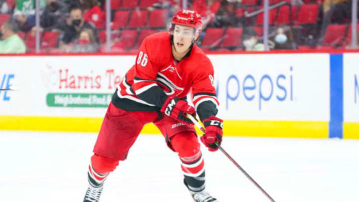 Apr 29, 2021; Raleigh, North Carolina, USA; Carolina Hurricanes left wing Teuvo Teravainen (86) skates with the puck against the Detroit Red Wings at PNC Arena. Mandatory Credit: James Guillory-USA TODAY Sports