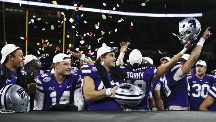 Dec 28, 2016; Houston, TX, USA; Kansas State Wildcats players celebrate after winning the Texas Bowl against the Texas A&M Aggies at NRG Stadium. Mandatory Credit: Troy Taormina-USA TODAY Sports