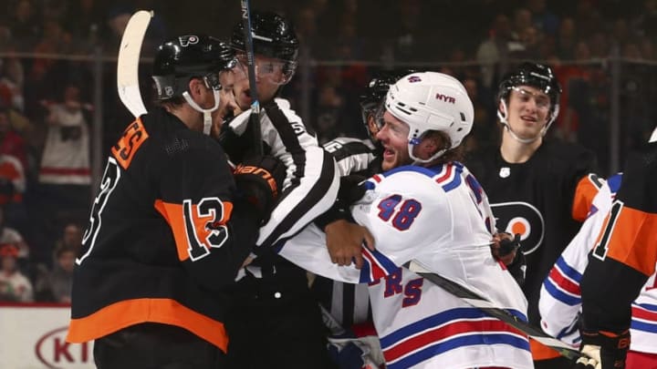 PHILADELPHIA, PA - DECEMBER 23: Kevin Hayes #13 of the Philadelphia Flyers gets in an altercation with Brendan Lemieux #48 of the New York Rangers in the third period at the Wells Fargo Center on December 23, 2019 in Philadelphia, Pennsylvania. The Flyers defeated the Rangers 5-1. (Photo by Mitchell Leff/Getty Images)