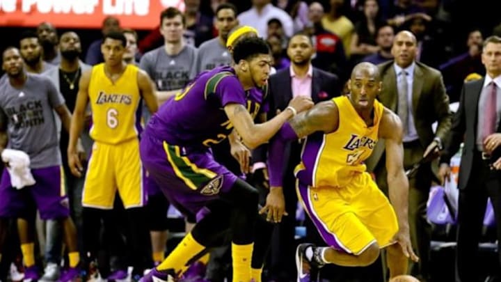 Feb 4, 2016; New Orleans, LA, USA; New Orleans Pelicans forward Anthony Davis (23) defends Los Angeles Lakers forward Kobe Bryant (24) during the fourth quarter of a game at the Smoothie King Center. The Lakers defeated the Pelicans 99-96. Mandatory Credit: Derick E. Hingle-USA TODAY Sports