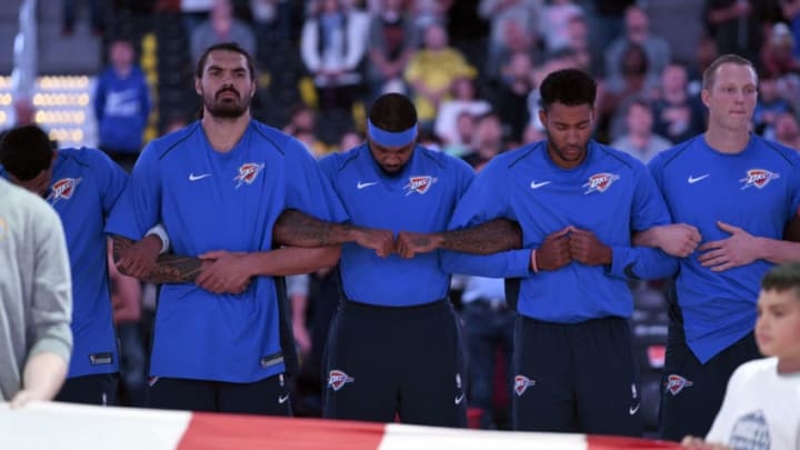 DENVER, CO - OCTOBER 10: OKC Thunder team lock arm during the playing of the national anthem before their game agains the Denver Nuggets on October 10, 2017 in Denver, Colorado at Pepsi Center. (Photo by John Leyba/The Denver Post via Getty Images)