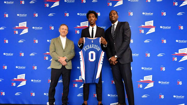 CAMDEN, NJ - JULY 12: Josh Richardson #0 of the Philadelphia 76ers, Josh Harris, and Elton Brand pose for a photo at a press conference on July 12, 2019 at the Philadelphia 76ers Training Complex in Camden, New Jersey. NOTE TO USER: User expressly acknowledges and agrees that, by downloading and/or using this photograph, user is consenting to the terms and conditions of the Getty Images License Agreement. Mandatory Copyright Notice: Copyright 2019 NBAE (Photo by Jesse D. Garrabrant/NBAE via Getty Images)