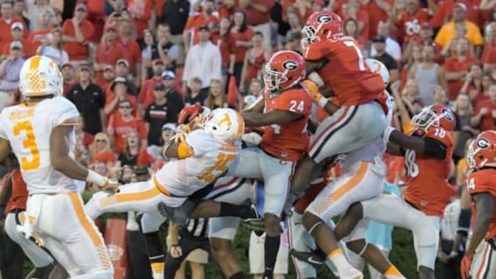 Oct 1, 2016; Athens, GA, USA; Tennessee Volunteers wide receiver Jauan Jennings (15) catches a game winning touchdown pass in front of Georgia Bulldogs safety Dominick Sanders (24) on the last play on the game during the fourth quarter at Sanford Stadium. Tennessee defeated Georgia 34-31. Mandatory Credit: Dale Zanine-USA TODAY Sports