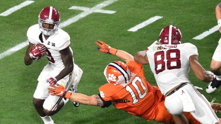 Jan 11, 2016; Glendale, AZ, USA; Alabama Crimson Tide wide receiver Calvin Ridley (3) runs the ball while defended by Clemson Tigers linebacker Ben Boulware (10) during the second quarter in the 2016 CFP National Championship at University of Phoenix Stadium. Mandatory Credit: Gary A. Vasquez-USA TODAY Sports