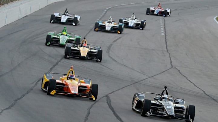 FORT WORTH, TX - JUNE 09: Ed Carpenter, driver of the #20 Ed Carpenter Racing Fuzzy's Vodka Chevrolet, leads a pack of cars during the Verizon IndyCar Series DXC Technology 600 at Texas Motor Speedway on June 9, 2018 in Fort Worth, Texas. (Photo by Robert Laberge/Getty Images)