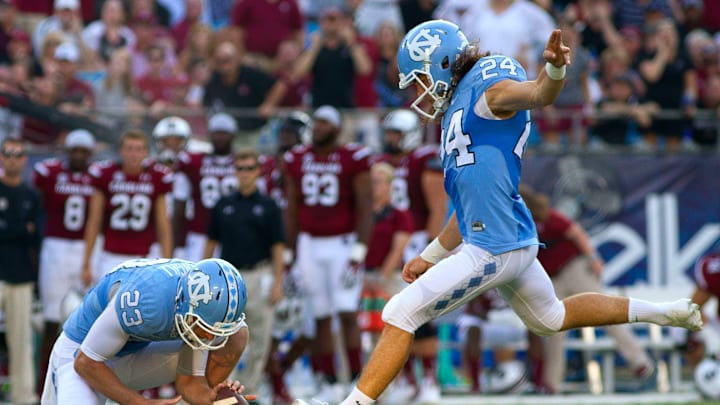 Sep 3, 2015; Charlotte, NC, USA; North Carolina Tar Heels place kicker Nick Weiler (24) kicks a field goal during the second quarter against the South Carolina Gamecocks at Bank of America Stadium. Mandatory Credit: Joshua S. Kelly-USA TODAY Sports