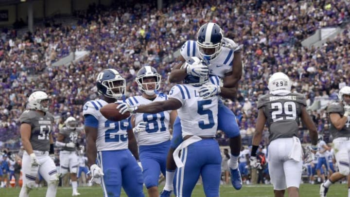 EVANSTON, IL- SEPTEMBER 08: Johnathan Lloyd #5 of the Duke Blue Devils celebrates his touchdown with his teammates against the Northwestern Wildcats during the first half on September 8, 2018 at Ryan Field in Evanston, Illinois. (Photo by David Banks/Getty Images)
