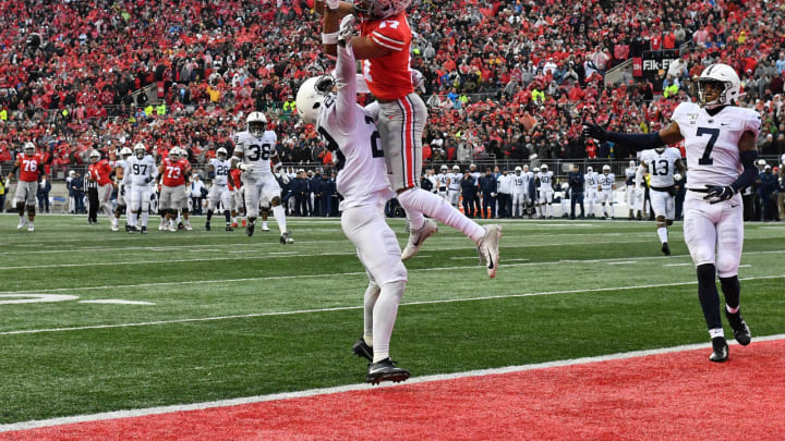 COLUMBUS, OH – NOVEMBER 23: Chris Olave #17 of the Ohio State Buckeyes makes the catch for a 28-yard touchdown pass over John Reid #29 of the Penn State Nittany Lions in the fourth quarter at Ohio Stadium on November 23, 2019 in Columbus, Ohio. Ohio State defeated Penn State 28-17. (Photo by Jamie Sabau/Getty Images)