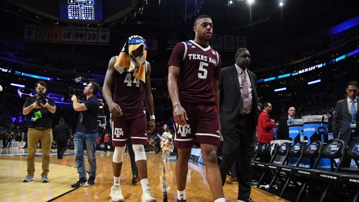 LOS ANGELES, CA – MARCH 22: Robert Williams #44 and Savion Flagg #5 of the Texas A&M Aggies walk off the court after their teams loss to the Michigan Wolverines in the 2018 NCAA Men’s Basketball Tournament West Regional at Staples Center on March 22, 2018 in Los Angeles, California. The Michigan Wolverines defeated the Texas A&M Aggies 99-72. (Photo by Harry How/Getty Images)