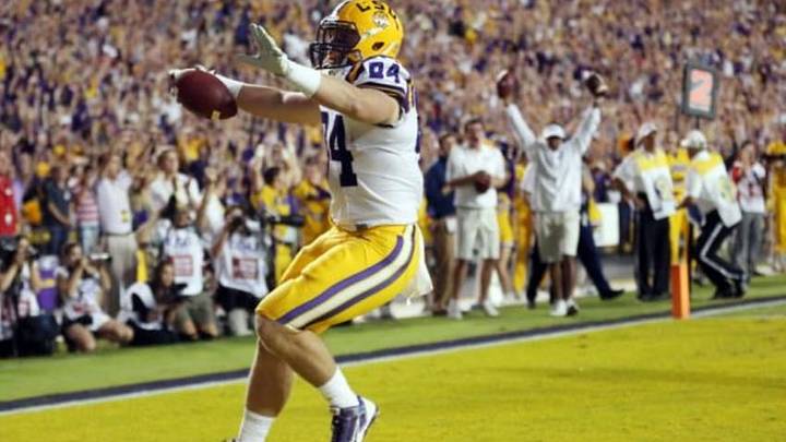 Oct 25, 2014; Baton Rouge, LA, USA; LSU Tigers tight end Logan Stokes (84) runs into the end zone for a touchdown in the fourth quarter against the Mississippi Rebels at Tiger Stadium. Mandatory Credit: Crystal LoGiudice-USA TODAY Sports Oct 25, 2014; Baton Rouge, LA, USA; LSU Tigers tight end Logan Stokes (84) runs into the end zone for a touchdown in the fourth quarter against the Mississippi Rebels at Tiger Stadium. Mandatory Credit: Crystal LoGiudice-USA TODAY Sports