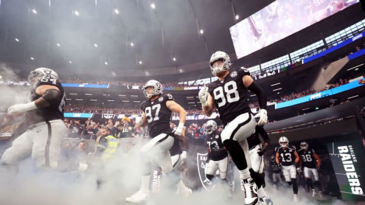 LONDON, ENGLAND - OCTOBER 06: Josh Mauro of Oakland Raiders and Maxx Crosby of Oakland Raiders run out of the tunnel ahead of the game between Chicago Bears and Oakland Raiders at Tottenham Hotspur Stadium on October 06, 2019 in London, England. (Photo by Naomi Baker/Getty Images)