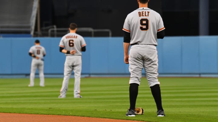 LOS ANGELES, CA - APRIL 01: San Francisco Giants First base Brandon Belt (9), San Francisco Giants Outfield Steven Duggar (6), San Francisco Giants Outfield Gerardo Parra (8) stand for the national anthem during a MLB game between the San Francisco Giants and the Los Angeles Dodgers on April 1, 2019 at Dodger Stadium in Los Angeles, CA. (Photo by Brian Rothmuller/Icon Sportswire via Getty Images)