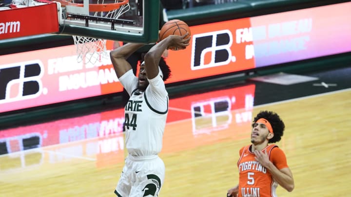 Feb 23, 2021; East Lansing, Michigan, USA; Michigan State Spartans forward Gabe Brown (44) dunks the ball during the second half against the Illinois Fighting Illini at Jack Breslin Student Events Center. Mandatory Credit: Tim Fuller-USA TODAY Sports