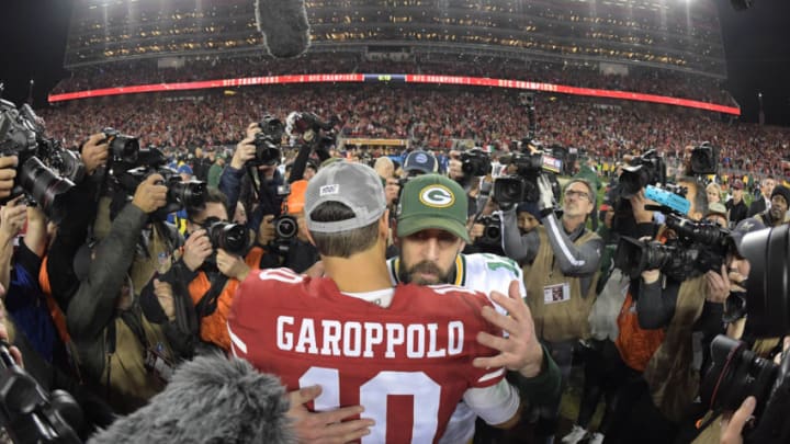 Jan 19, 2020; Santa Clara, California, USA; San Francisco 49ers quarterback Jimmy Garoppolo (10) hugs Green Bay Packers quarterback Aaron Rodgers (12) after the NFC Championship Game at Levi's Stadium. Mandatory Credit: Kirby Lee-USA TODAY Sports