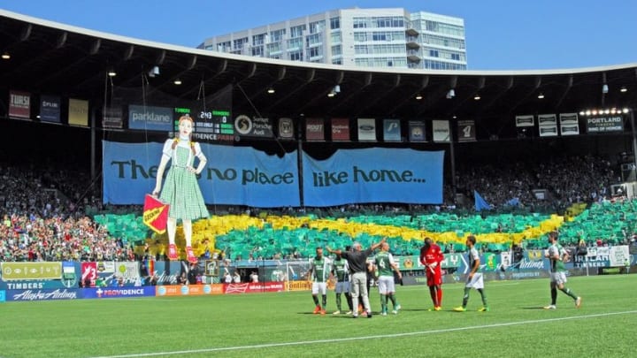 Aug 24, 2014; Portland, OR, USA; The Timbers Army raises the Tifo before the game of Portland Timbers and the Seattle Sounders at Providence Park. Mandatory Credit: Susan Ragan-USA TODAY Sports