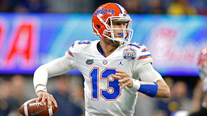 ATLANTA, GEORGIA - DECEMBER 29: Feleipe Franks #13 of the Florida Gators looks to pass against the Michigan Wolverines in the first quarter during the Chick-fil-A Peach Bowl at Mercedes-Benz Stadium on December 29, 2018 in Atlanta, Georgia. (Photo by Mike Zarrilli/Getty Images)