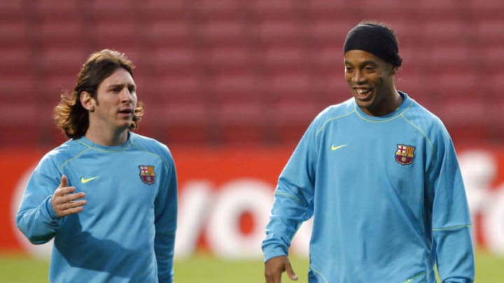 Lionel Messi and Ronaldinho of Barcelona