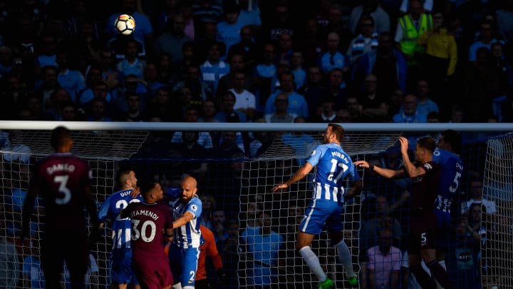 BRIGHTON, ENGLAND – AUGUST 12: Glenn Murray of Brighton and Hove Albion attempts to head towards goal during the Premier League match between Brighton and Hove Albion and Manchester City at the Amex Stadium on August 12, 2017 in Brighton, England. (Photo by Mike Hewitt/Getty Images)