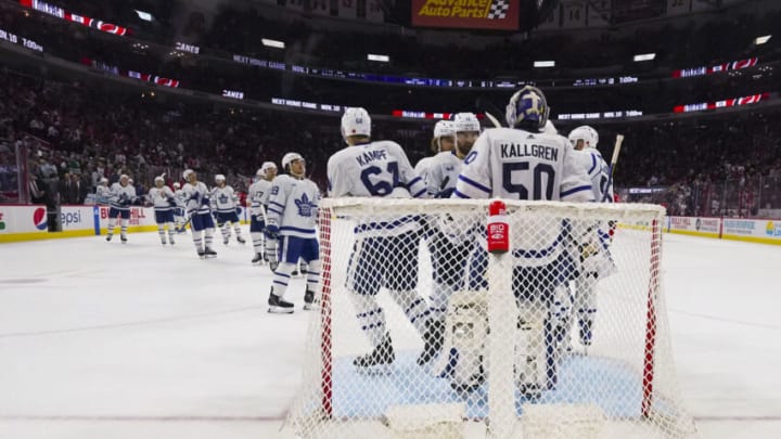 Nov 6, 2022; Raleigh, North Carolina, USA; Toronto Maple Leafs players celebrate their victory against the Carolina Hurricanes at PNC Arena. Mandatory Credit: James Guillory-USA TODAY Sports